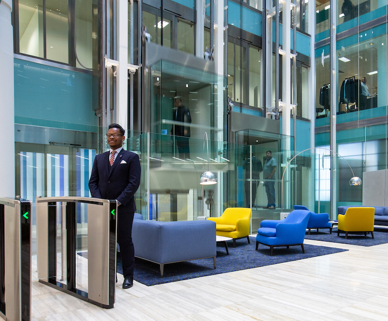 Security-Officers-in-a-building-reception Security-Officers-in-a-building-reception
